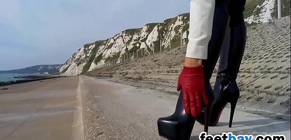  Woman In Leather Boots And Gloves Outside